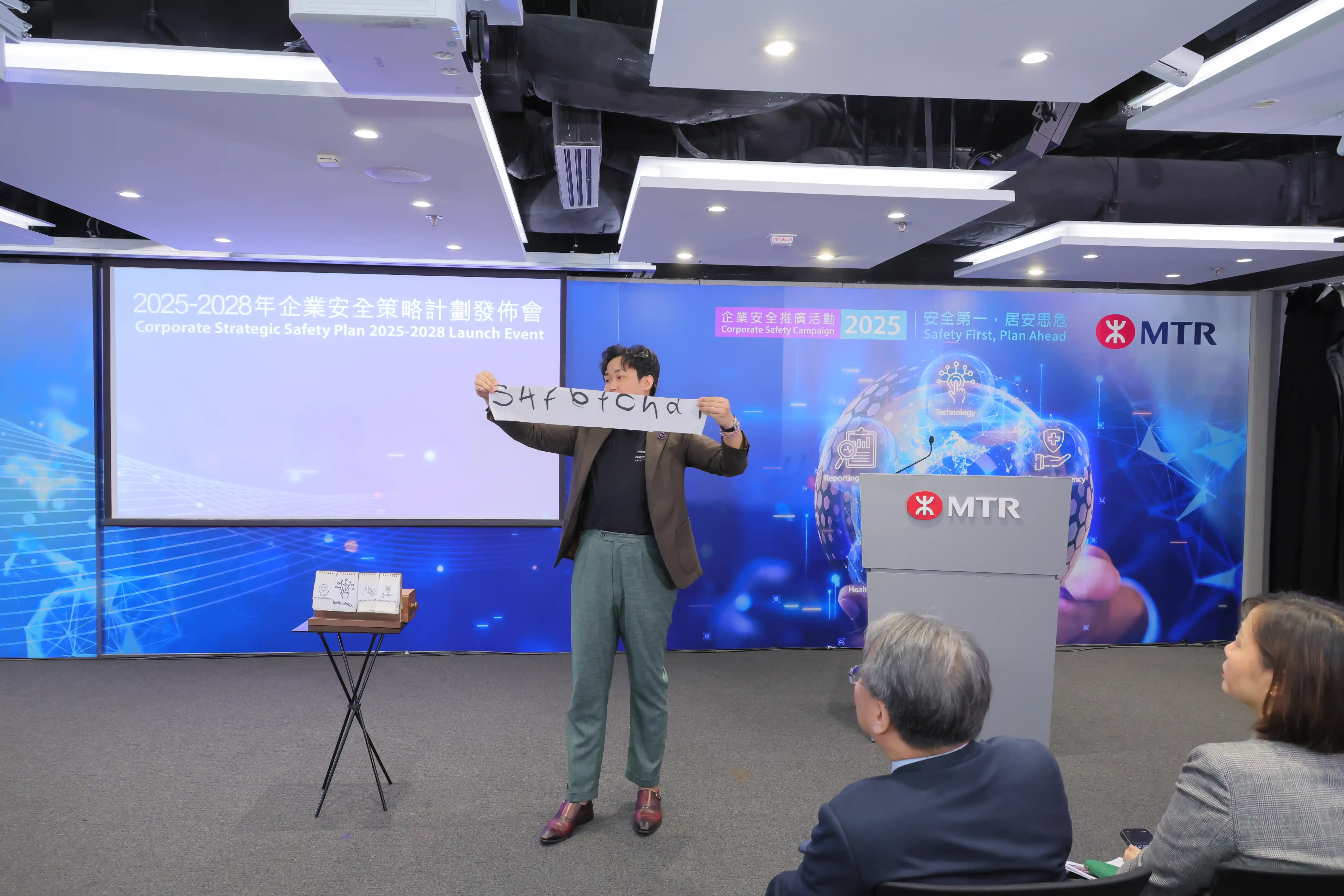 Magician revealing a prediction or message, symbolizing strategic focus announcements