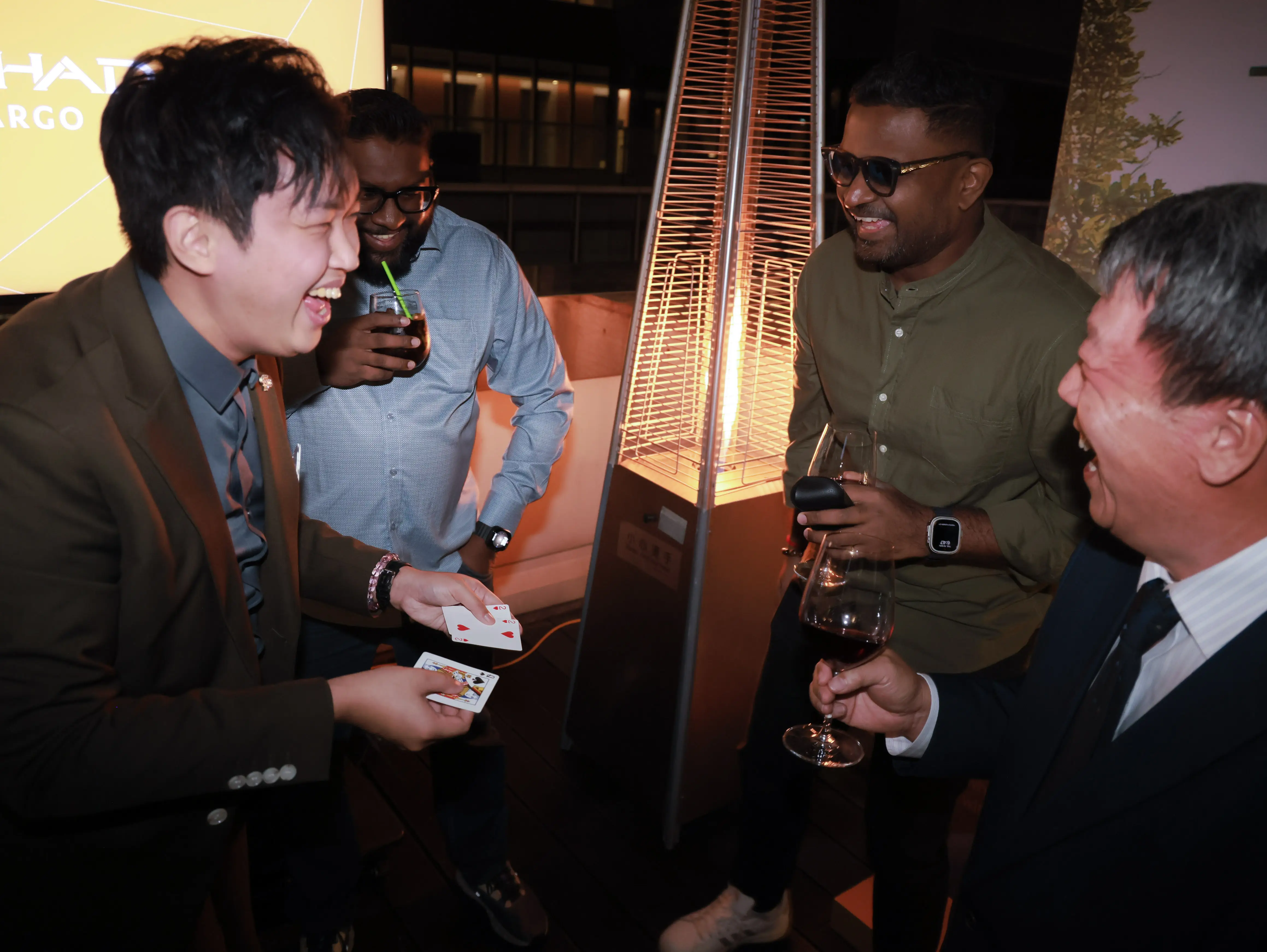 Party magician for adults creating reactions at a dinner party