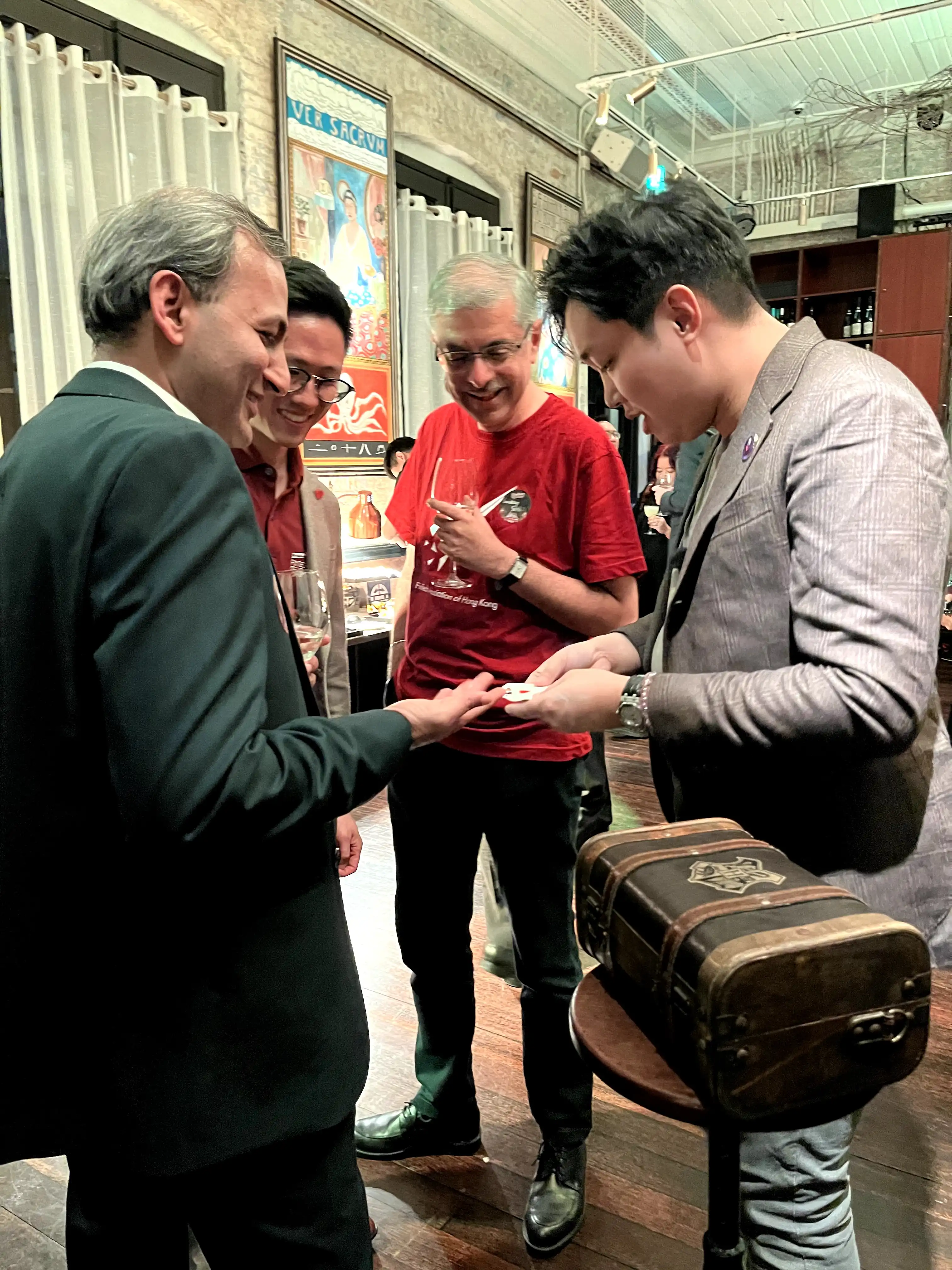 Close-up magician roving and mingling with guests