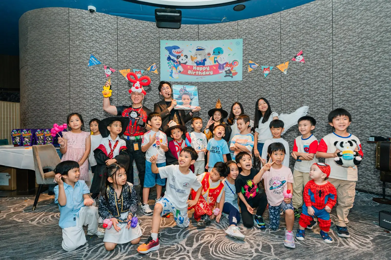 Magician at kids party ending show with big applause