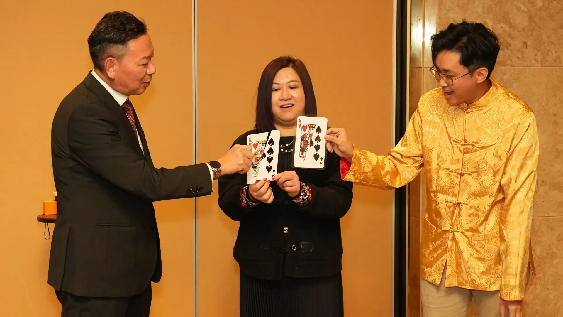 Elegant magician performing at an adults party